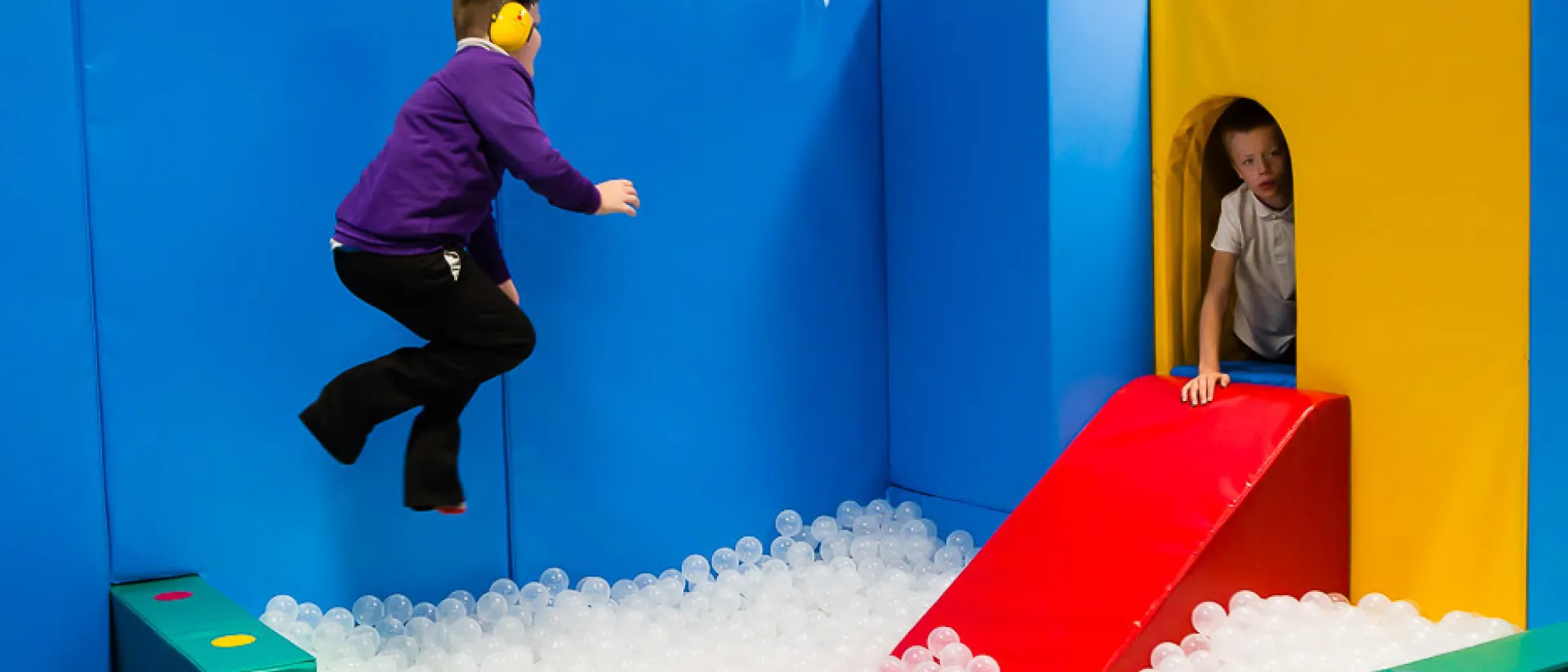 Children enjoying the Polden Bower soft play room.