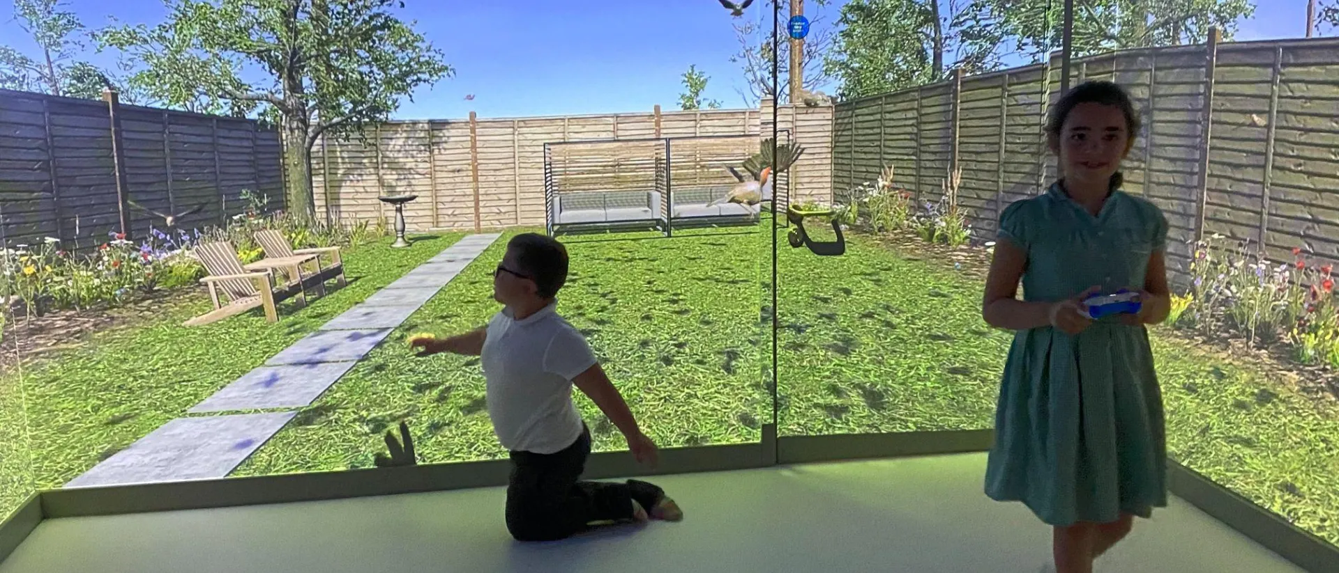 Aspire School immersive room with a garden projection.