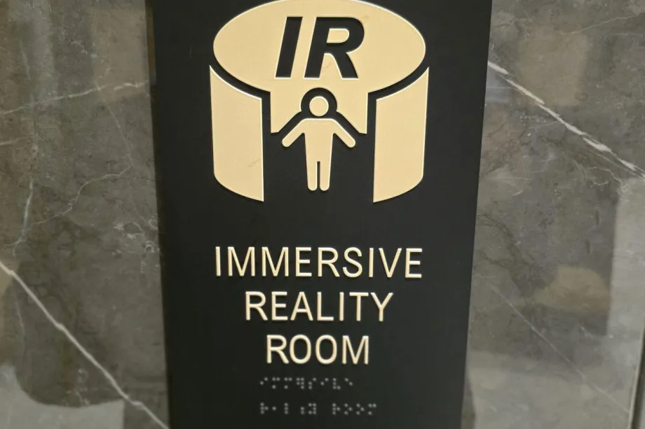 An image showing the sign for the Immersive Reality room at Hector Fargo airport
