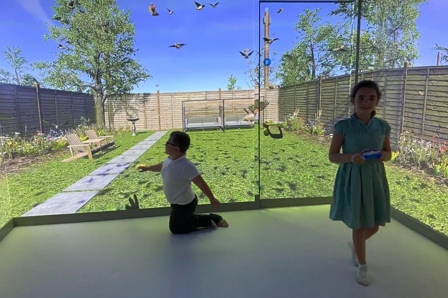 Aspire School immersive room with a garden projection.